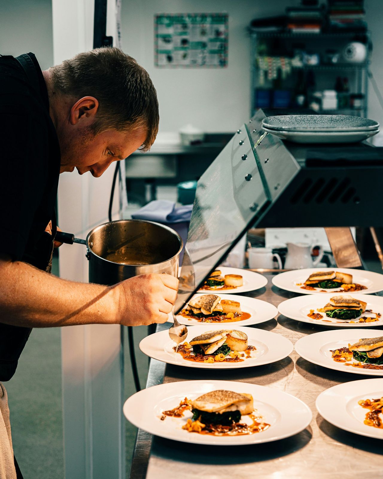 Chef finishing plates